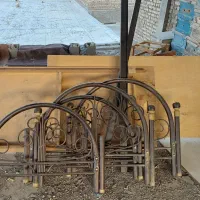 تخت خواب فلزی همراه با کفی چوبی