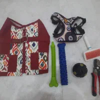 وسایل سگ شامل لباس، قلاده، پرزگیر، شانه باقیمت کم