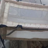 گهواره و پشه بند نوزاد