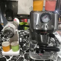 قهوه ساز همراه آسیاب برقی کم کارکرد