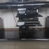 میز تلویزیون شیشه‌ای
