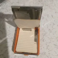 دفتر تلفن فلزی قدیمی|کلکسیون اشیاء عتیقه|اصفهان, درب کوشک|دیوار