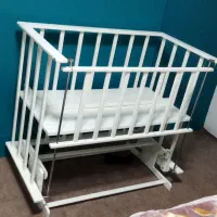 تخت کنار مادر ژیک