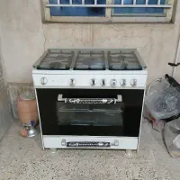 اجاق گاز فر دار جوجه گردان