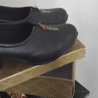 کفش|کیف، کفش، کمربند|قم, قلعه کامکار|دیوار