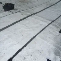 نصب ایزوگام قیر گونی پشت بام سرویسهای بهداشتی