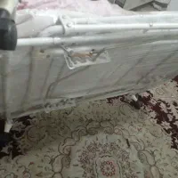 گهواره بچه چرخ دار متحرک با قابلیت تنظیم ارتفاع