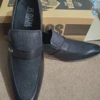 کفش آکبند و نوو|کیف، کفش، کمربند|مهاجران, |دیوار