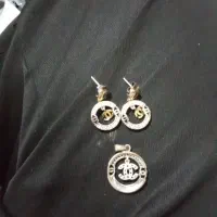 گوشواره وپلاک گردنبند