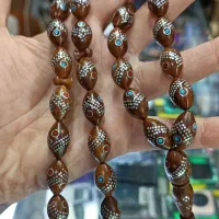 تسبیح کشکول نقره کوب|جواهرات|مسجد سلیمان, |دیوار