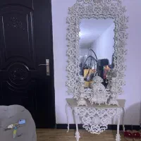اینه و کنسول شمعدان ‌ساعت