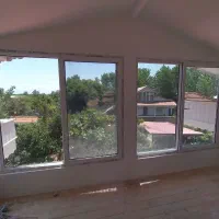 تولیدی درب و پنجره دوجداره UPVC و توری پلیسه ای