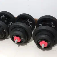 تعدادی دمبل بدنسازی و وزنه