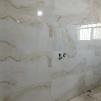 اجرای کاشی کاری و سنگ و نما و...