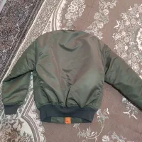 کاپشن‌خلبانی‌|لباس|اندیشه, شهرک صدف|دیوار