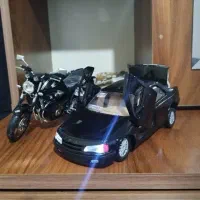 ماکت پژو پارس مشکی و سیبی مشکی شال طلا