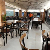 صندلی پشت ضربدری  رستوران کبابی طباخی و کافه ای|کافی‌شاپ و رستوران|تهران, دانشگاه شریف|دیوار