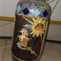 گلدان با گل مصنوعی