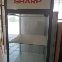 ویترین مغازه چهار طرف شیشه