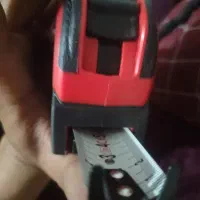 متر و عینک و دستکش