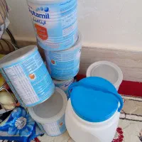 قوطی شیر خشک و دبه ماست