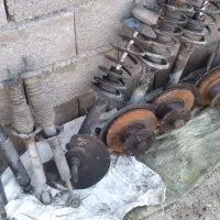 فنر کمک اکسل درب اگزوز جعبه فرمان  دف بوستر بخاری