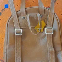 کوله پشتی تمام چرم رنگ زعفرانی