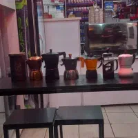 تراول ماگ ،موکاپات،قهوه و دستگاه اسپرسو ساز خانگی
