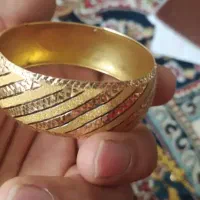 مقداری طلا به وزن 57 گرم  قیمت تابلو