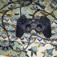 دسته پلی استیشن و کامپیوتر