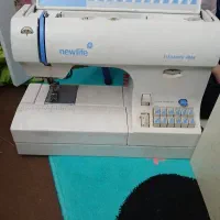 چرخ خیاطی کاچیران همراه میز اتو