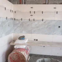 سنگ کاری. کاشی کاری. سیمان کاری.