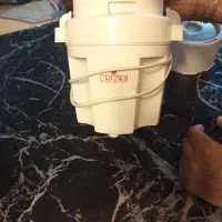 یک عدد دستگاه خردکن و یک عدد زیری سماور