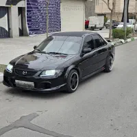 مزدا۳۲۳  (فول اسپرت )           اتوگالری بهادر