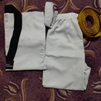 لباس تکواندو تمیز و سالم ترحد نو تا ۹سال میشه