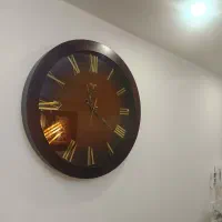 ساعت دیواری دور چوبی