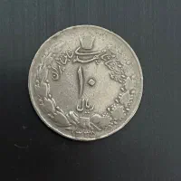 تعدادی سکه و اسکناس قدیمی