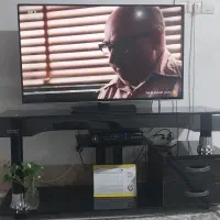 میز تلویزیون شیشه ای