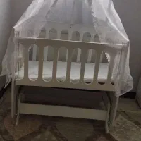 تخت کنارمادر گهواره ای