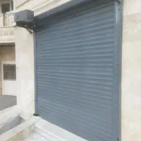 سکوریت.درب کرکره برقی  شیشه ساختمانی و توری پلیسه