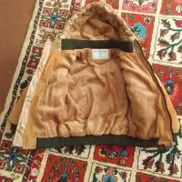 کاپشن|لباس|تربت جام, میان جام|دیوار