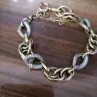 دستبند طلاوزن 17.560 گرم فاکتور داره