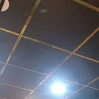 تایل گچی سقفی مشکی طلایی شیک