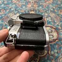 دوربین قدیمی آنالوگ کانن Canon AE-1 سالم و سرحال|دوربین عکاسی و فیلم‌برداری|تهران, شهرک چیتگر|دیوار