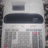 ماشین حساب کاسیو برقی و سه حلقه لاستیک بارز