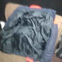 کاپشن|لباس|قم, شاد قلی|دیوار