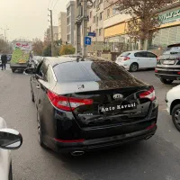 اپتیما ۲۰۱۳مشکی فول|خودرو سواری و وانت|تهران, درختی|دیوار