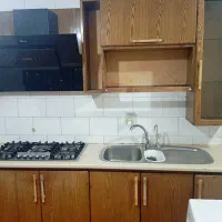 فروش کابینت چوبی همراه هود و گاز سینک و شیرآلات