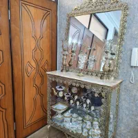 آینه کنسول همراه با شمعدان ها و انگور برنز