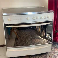 اجاق گاز فر دار و جوجه گردان ومحفظه گرم نگهدارغذا